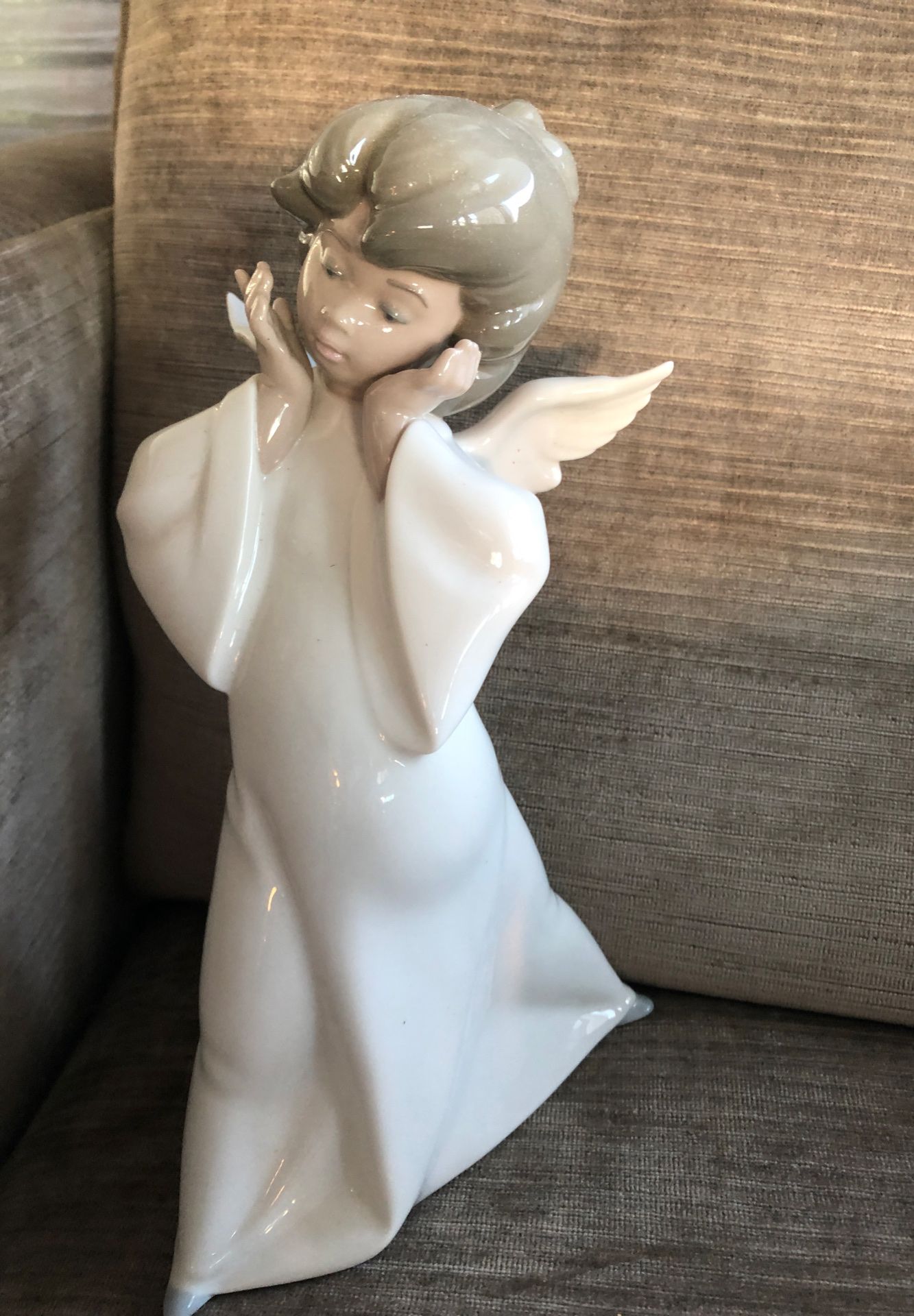 Lladro figurine- Cherub, Puzzled