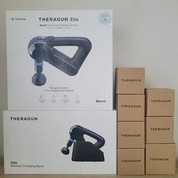 THERAGUN ELITE. Wireless charging station plus extra attachments and power adapter