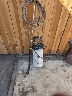 Electric power washer with hose