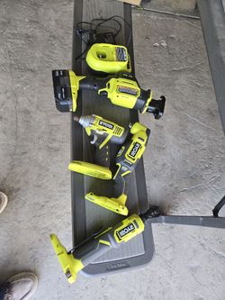 4 Ryobi Tools One Battery And A Charger 