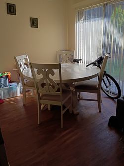 White farm style dining table with 4 chairs