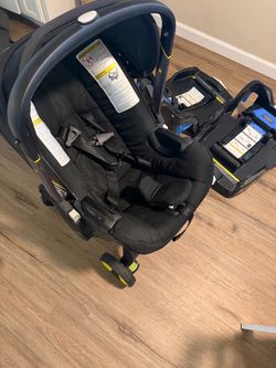Doona car seat stroller with TWO bases
