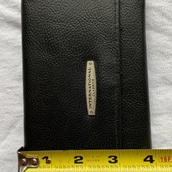 International Classics black wallet/ faux leather
