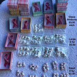 Breast Cancer glass beads and glass ribbons.  Prices vary