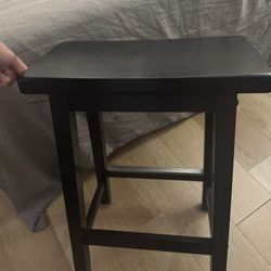 4 wooden bar stools.  dark brown