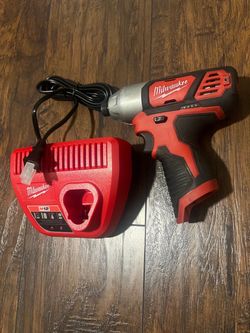 Milwaukee m12 impact drill and charger $70