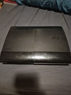 PS3 with Assortment Of Games