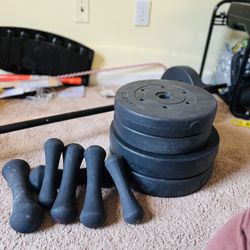 Assorted Weights With Barbell 
