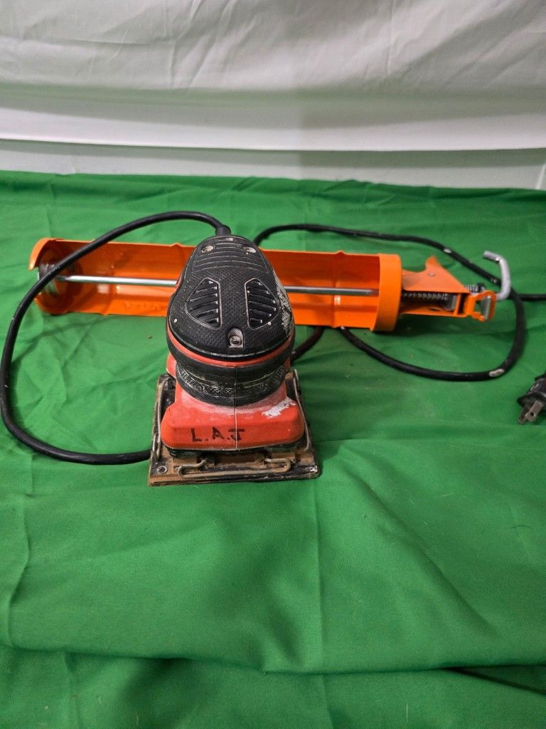 Sander And Caulk Gun