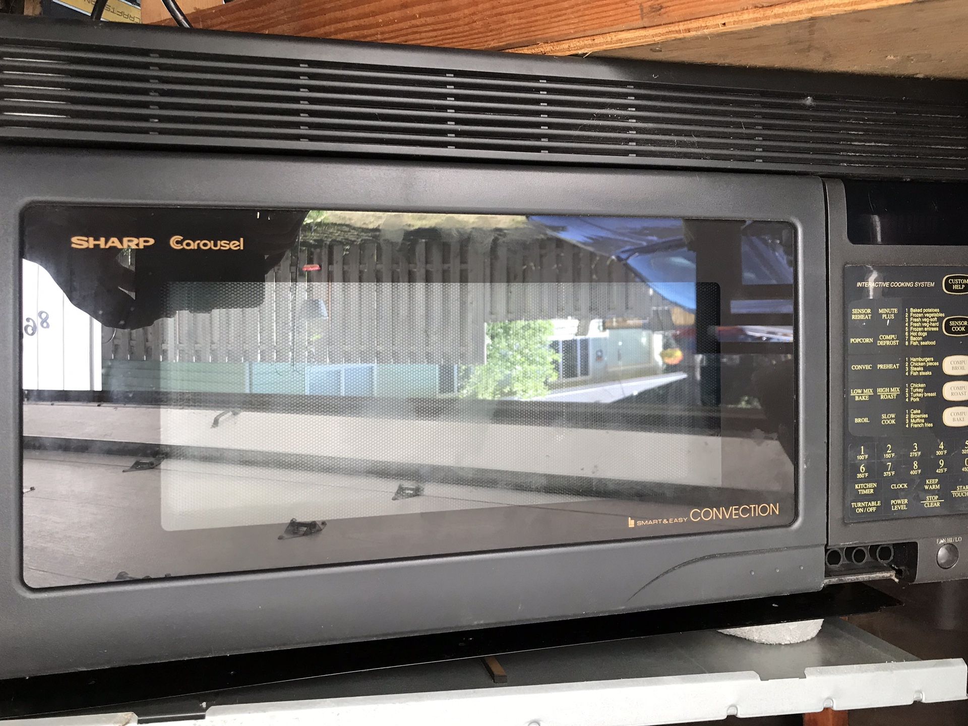 Sharp convection hood mount microwave