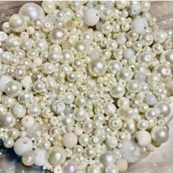 Assorted pearl-style and cream beads.