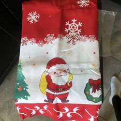 🎄 Christmas Tablecloth 120x60 – Santa & Tree Design (NEW) 🎅 📍 Pickup: S. Durango & 215  ✨ Price: $10 (Firm) Brand new, never used.  Bring instant h