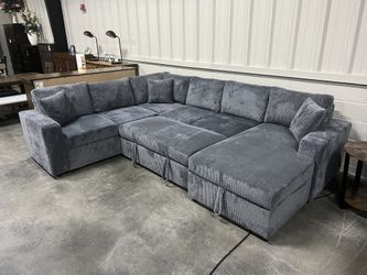 Sectional With Pullout Bed And Storage Chaise 