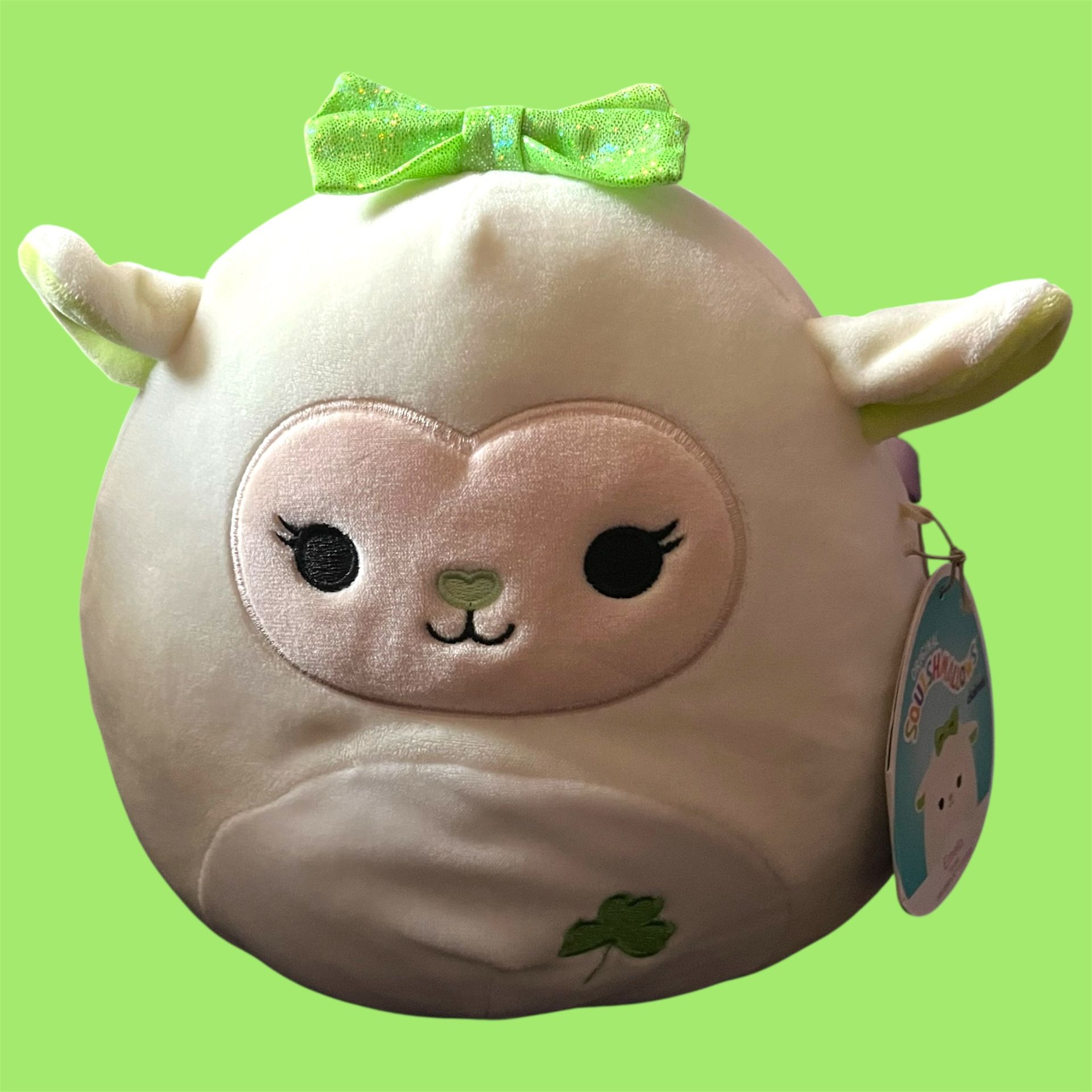 Squishmallows for Claire’s Emela the lamb 8 inch Emela is a pale green lamb with a peach colored face. Her nose is lime green, matching her inner ear