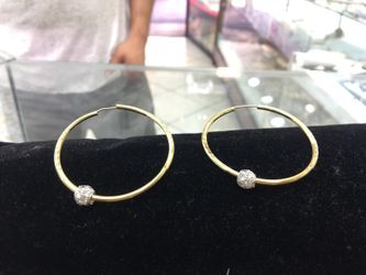 14k yellow gold with diamond hoop earings