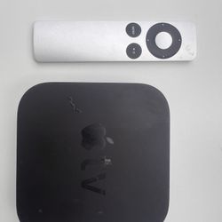 Apple TV which came with an **aluminum Apple Remote