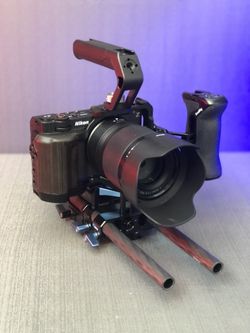 Nikon ZR Cinema Camera with 50mm f/1.4 Lens full rigged with camera cage, side handle, top handle, rig base kit