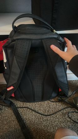 black sprayground backpack