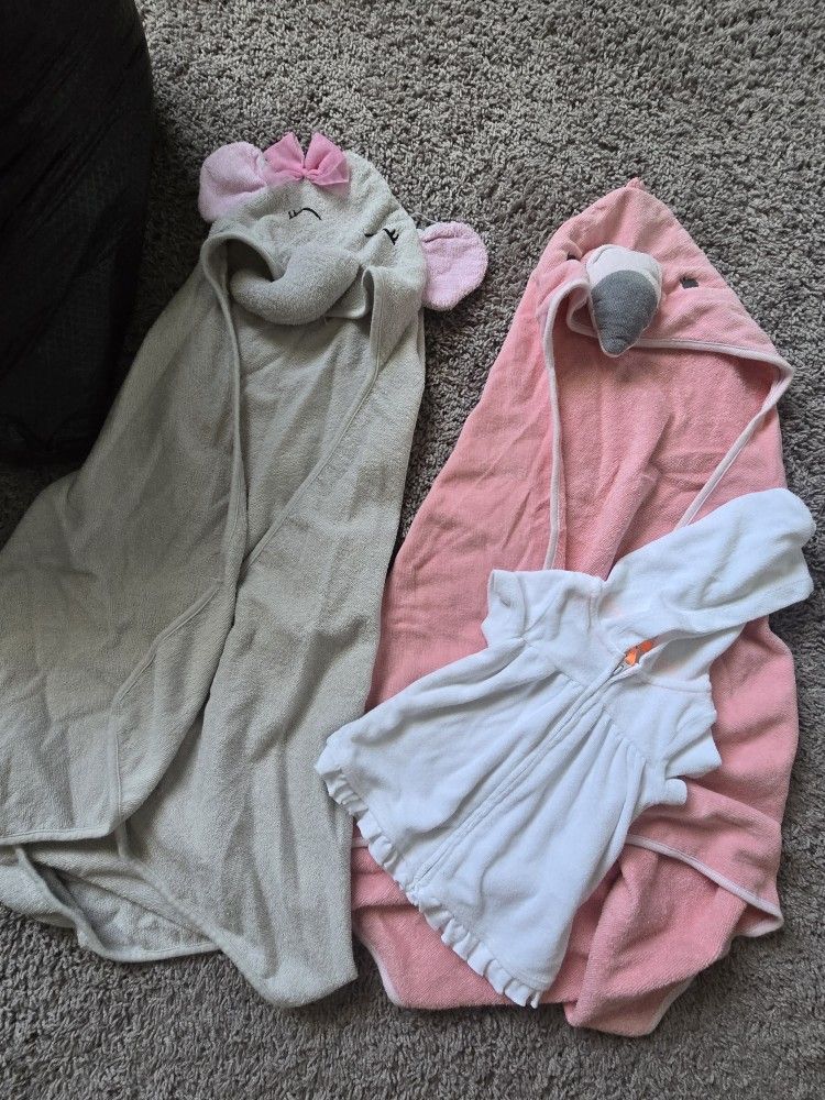 Two Hooded Towels And Sweater Towel