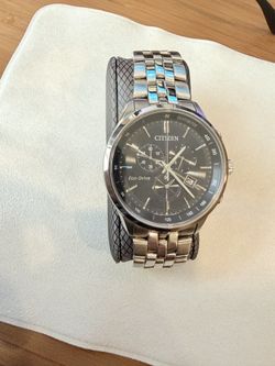 Citizen Men’s Classic Coral Eco-Drive Watch