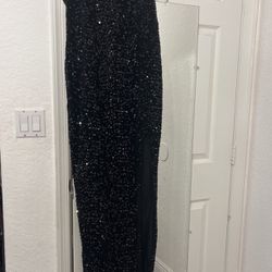 Large black sequin prom dress with slit