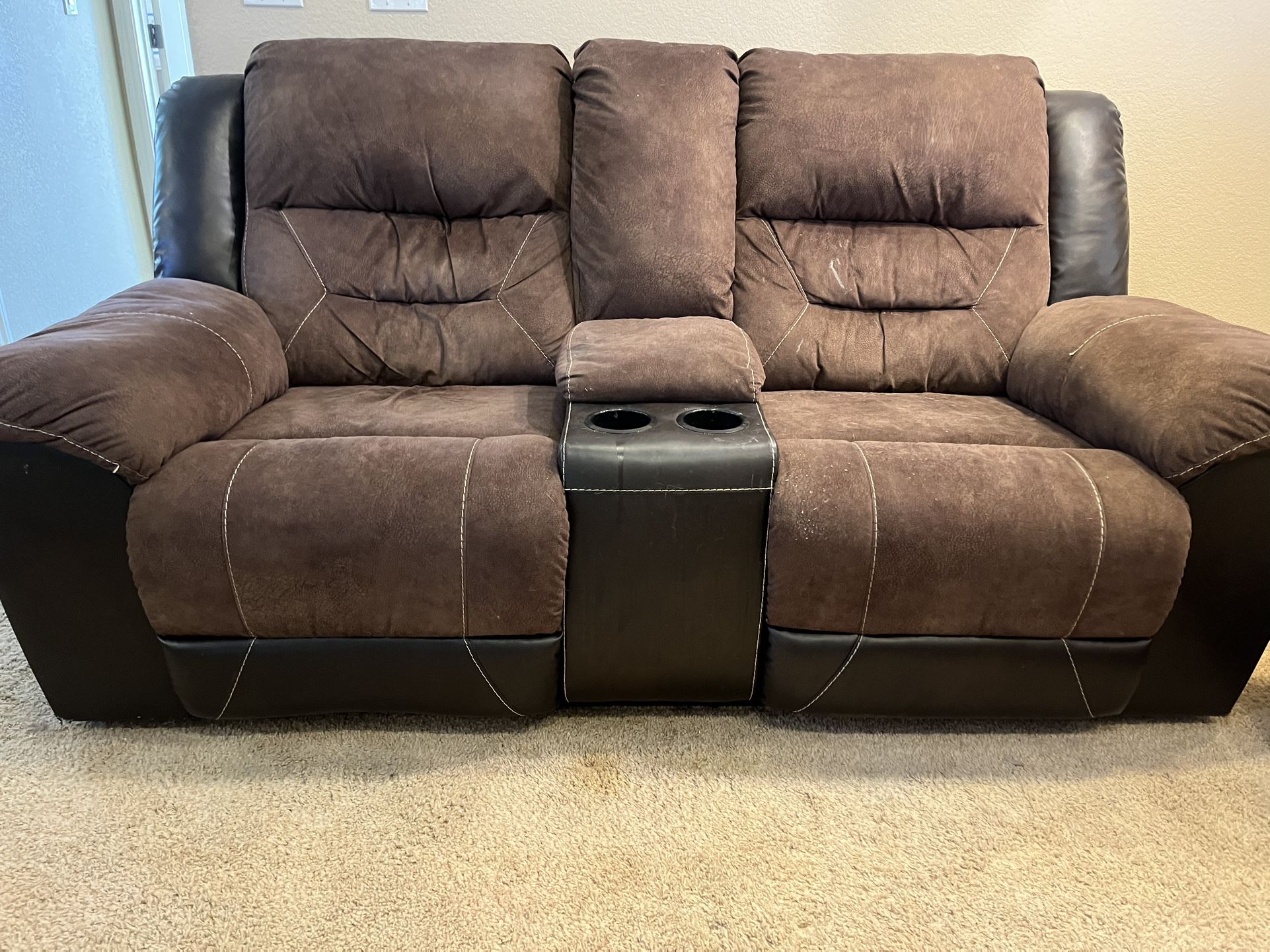 Reclining two seater sofa