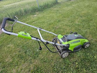 Green works lawn mower, electric , 10 amp, 16", no battery operated