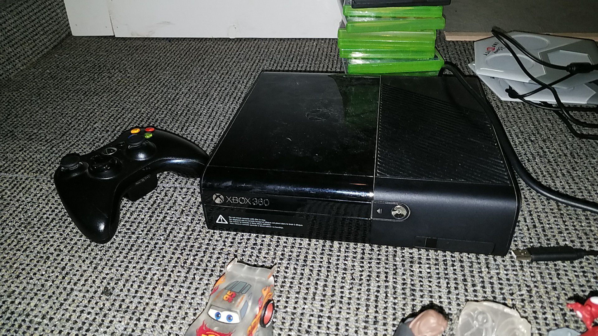 Xbox 360 with lot game xfinty set with , characters with two remotes and it works perfectly fine