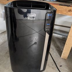 Delonghi Pinguino Portable AC/ Heater WITH REMOTE CONTROL 