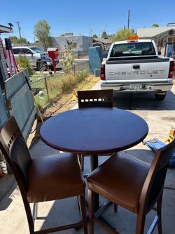 Tall table with 3 chairs