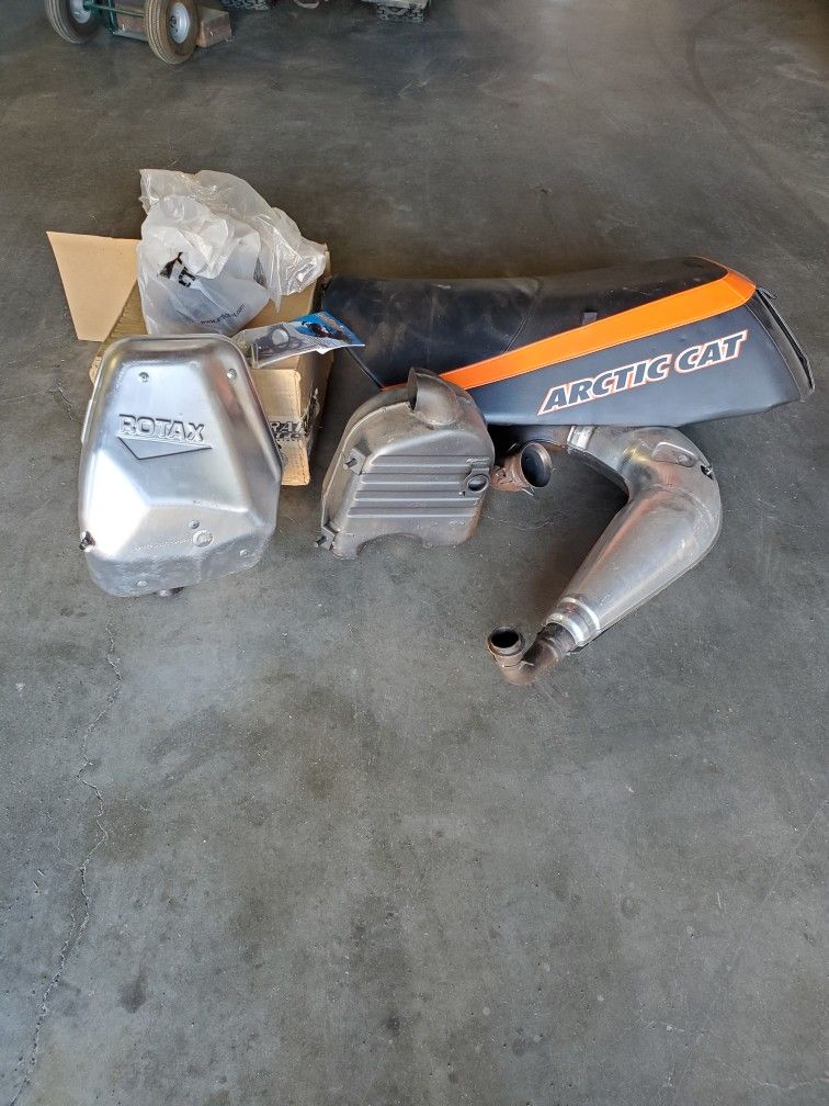 Arctic Cat Exhaust & Seat