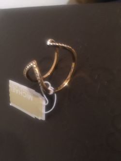 Michael Kors Ring adjustable new color gold, serous buyers only OBO.