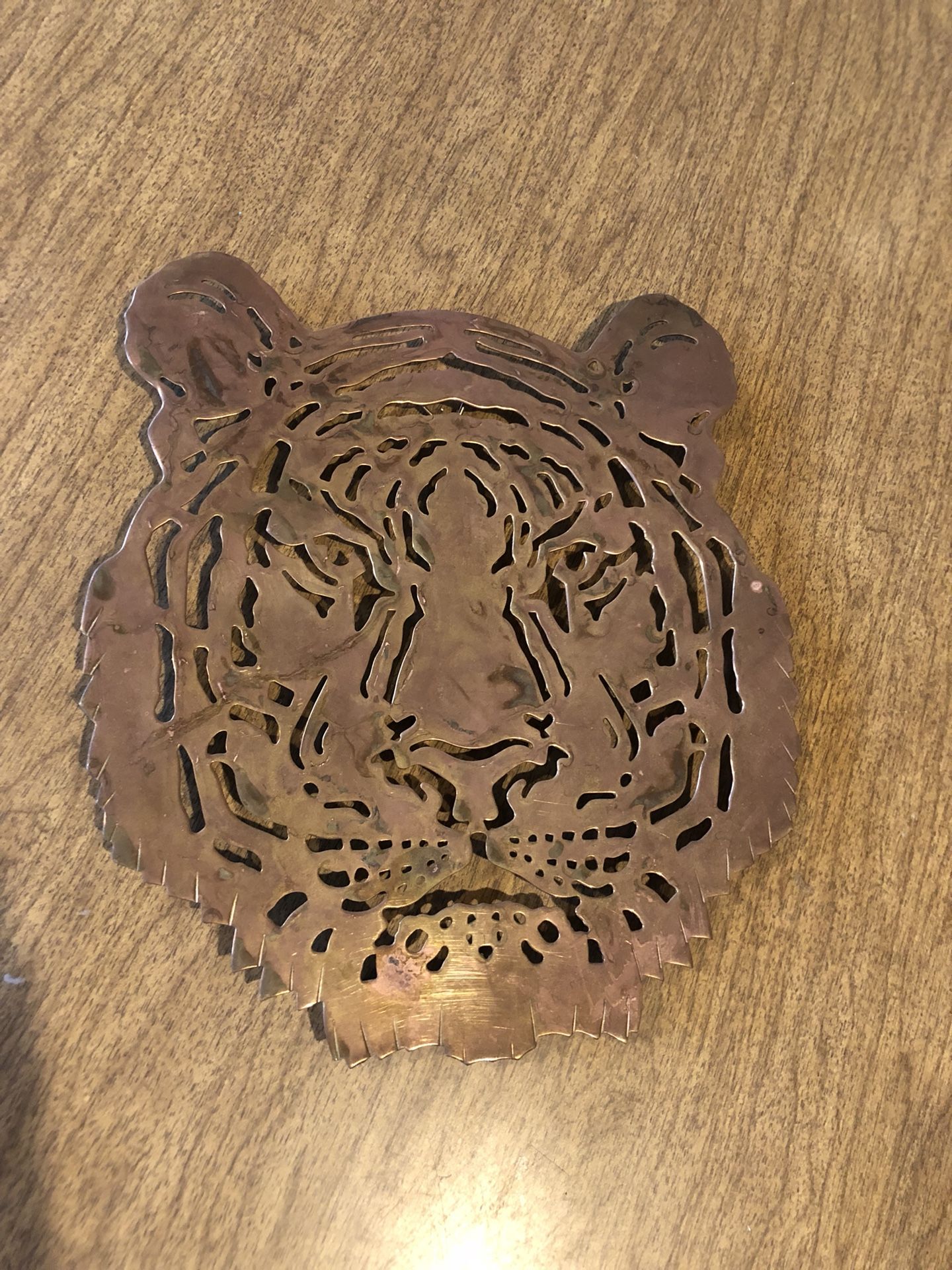 Antique tiger trivet