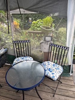 Bistro set with two matching chairs Bistro set with two matching chairs