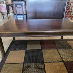 T317-13 Ashley Furniture Mattie - Reddish Brown Occasional Table Set