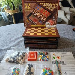 The Deluxe Game Gallery Wood Finish includes 12 classic board games perfect for 4 players or more. Made by Anker Play Products, this game board featur