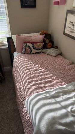 Twin Bed with Dark Wood Frame