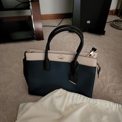 Brand New Kate Spade Handbag
Navy/Beige
Includes Storage Bag