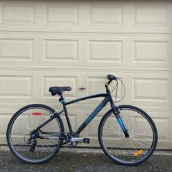 Infinity Boss Three 7-Speed Hybrid Bike – 700c Wheels, Matte Black Bicycle