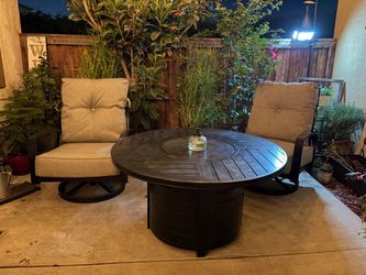 2 Ashley Mathis outdoor patio swivel and rock chairs