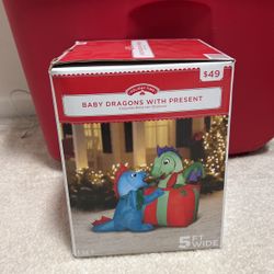 Holiday Time Baby Dragon With Present 5 Feet Wide Inflatable 