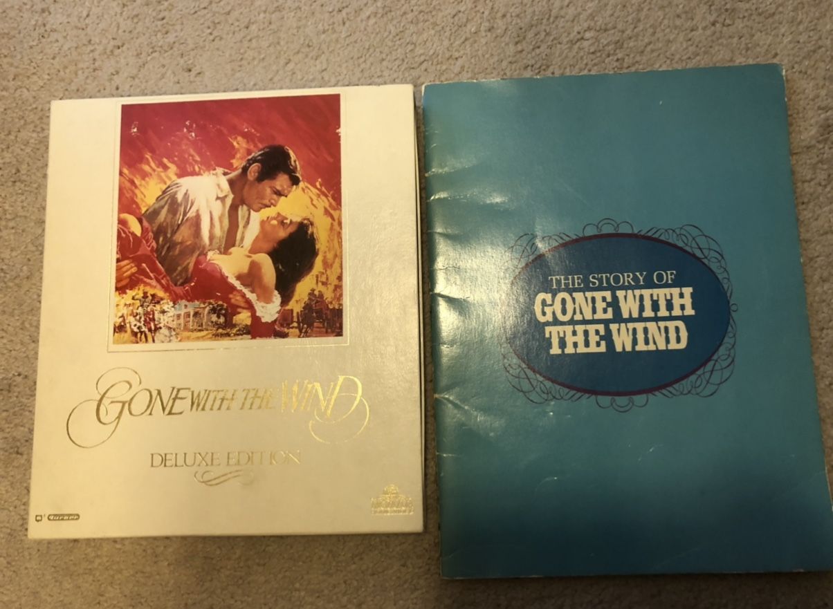 $30 Commemorative 1967 Gone With the Wind studio release booklet, 2pk VHS deluxe edition set, and two framed pictures!