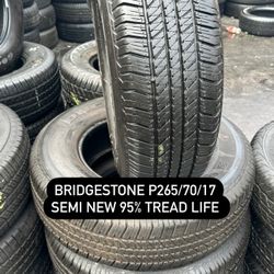 SET OF FOUR USED TIRES 265/70/17 BRIDGESTONE 