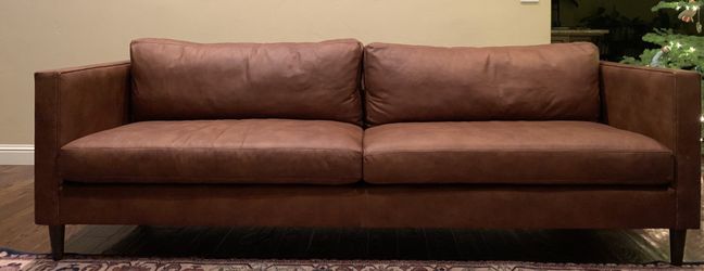 100” custom leather sofa by Roger and Chris
