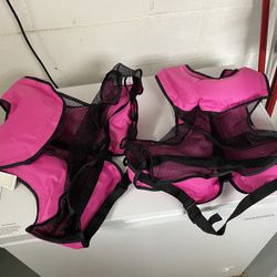 Life Jackets-new with tags-unused.Adjustable to fit adults or kids. 