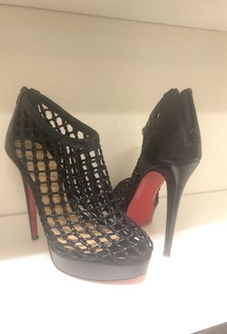Christian Louboutins "red bottoms" size 41