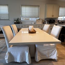 Expandable White Dining with Chairs