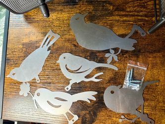 Metal Bird Wall Art Silhouette Garden Art Set of 5   Designed to be attached to fences, trees, or wooden posts.   Raw/unfinished metal meant to weathe