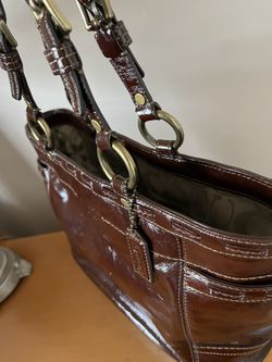 It’s Very Good Coach Bag It Is Big Size Bag The Color Is Dark Brown It’s Barely Used