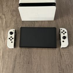 OLED switch with dock